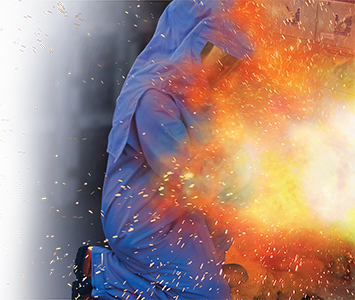 image of arc flash explosion - man with arc rated suit